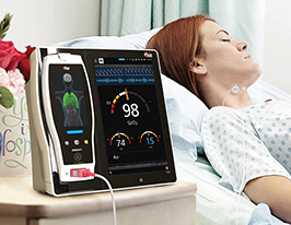 patient in bed with Masimo Root with rainbow Acoustic Monitoring (RAM) of Respiration Rate (RRa) with RAS-45 Sensor